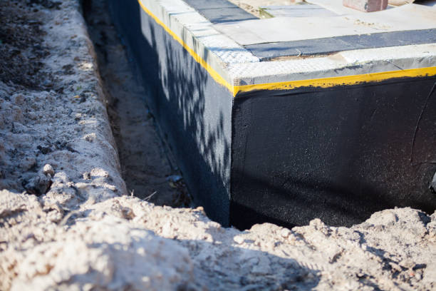 Professional Waterproofing technician working in Colgate, WI